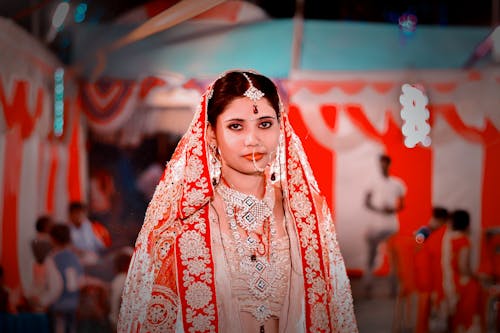 Selective Focus Photography of Woman In Traditional Wear