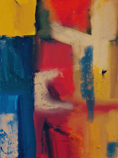 An abstract painting with red, yellow and blue colors