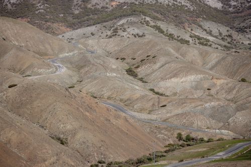 Free Aerial view of winding road through rolling hills in Elazığ, Türkiye. Stock Photo