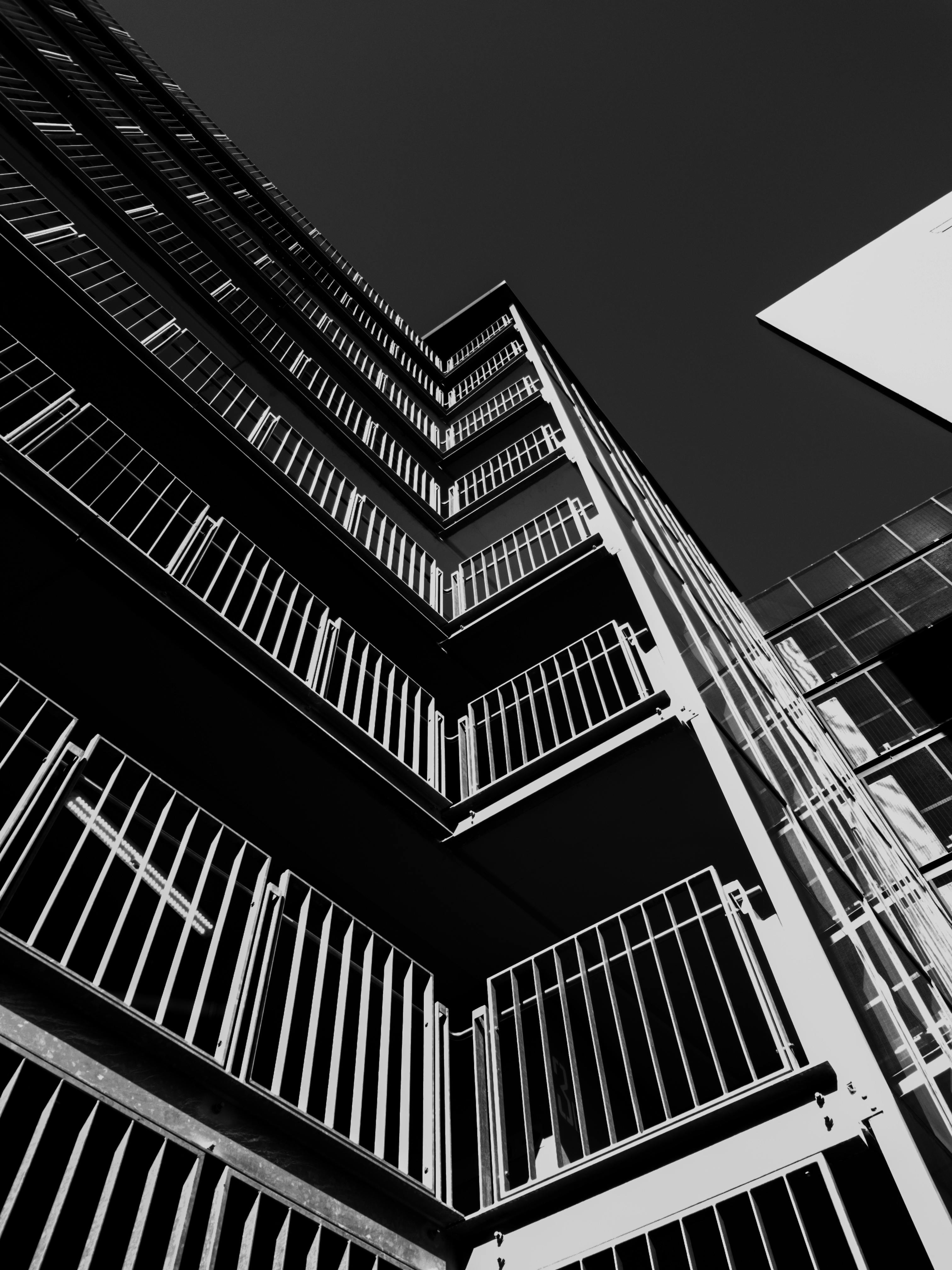 Architectural Photography of White and Black Building · Free Stock Photo