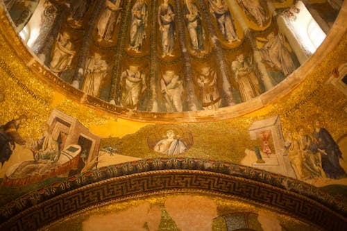 The dome of a church with paintings on it