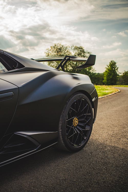 Black Sport Car on a Road · Free Stock Photo