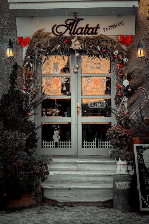 A photo of a restaurant with christmas decorations