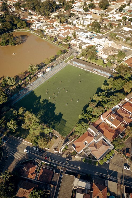 Aerial view of a soccer field in a city