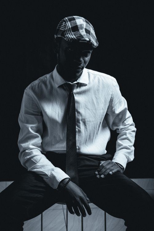 Free Black and white studio portrait focusing on fashion style. Stock Photo