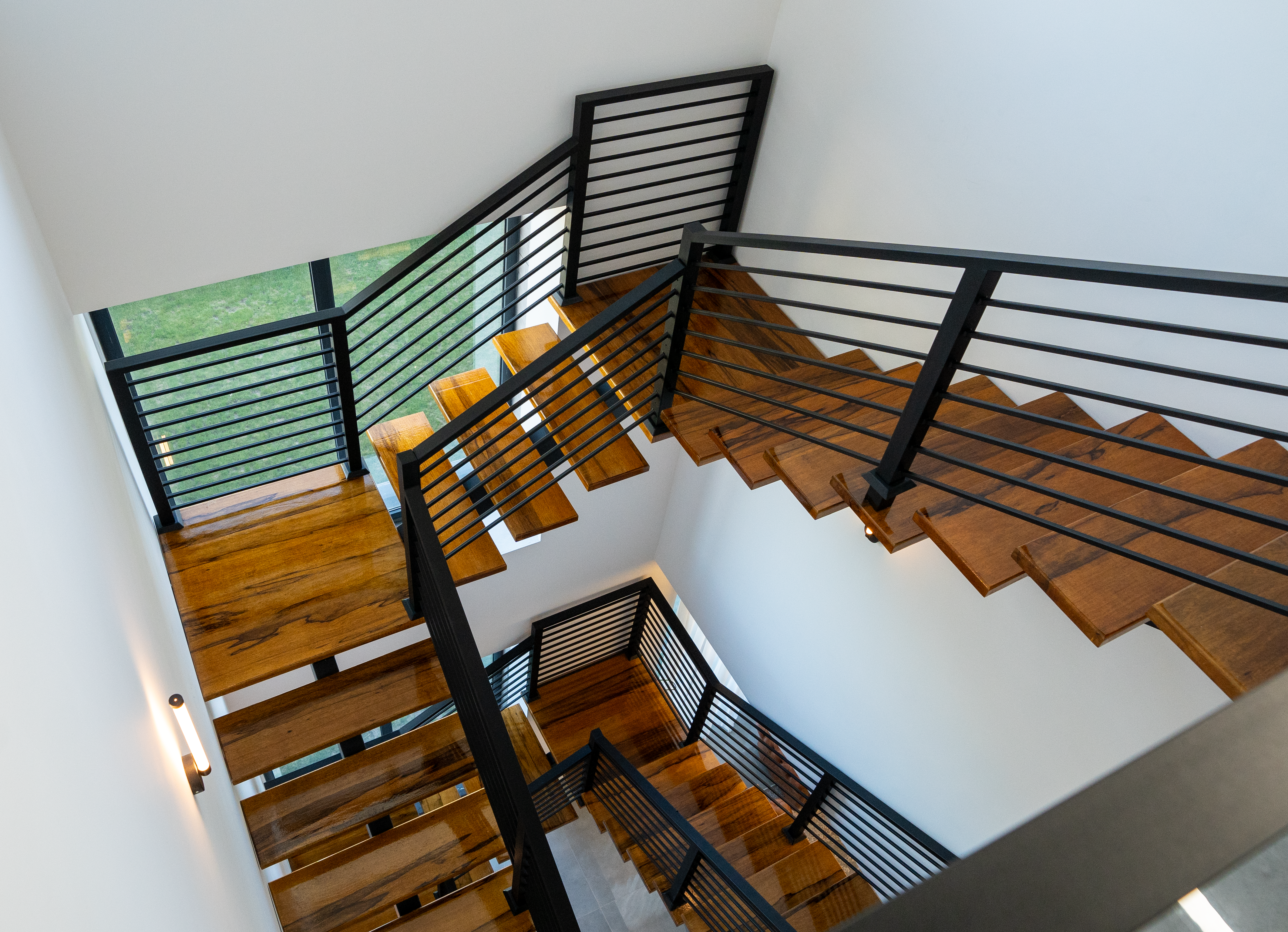 Modern staircase with straight clean lines in a bright interior