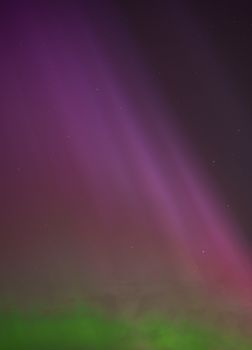 Colorful aurora borealis illuminates the night sky in Moss, Norway.