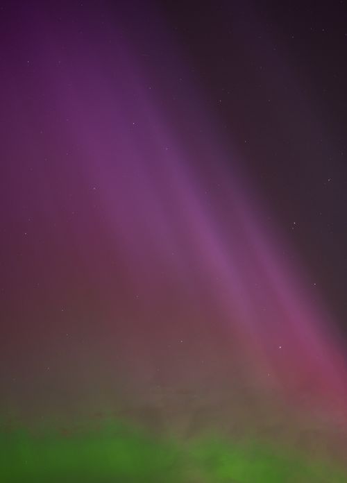 Free Colorful aurora borealis illuminates the night sky in Moss, Norway. Stock Photo