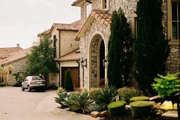 Elegant stone mansion with gated entry in Texas