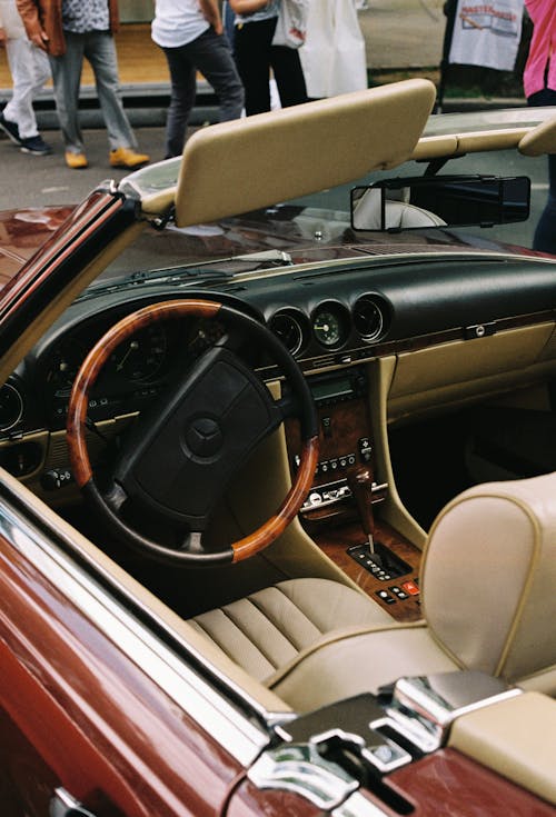 A car with a leather interior and steering wheel