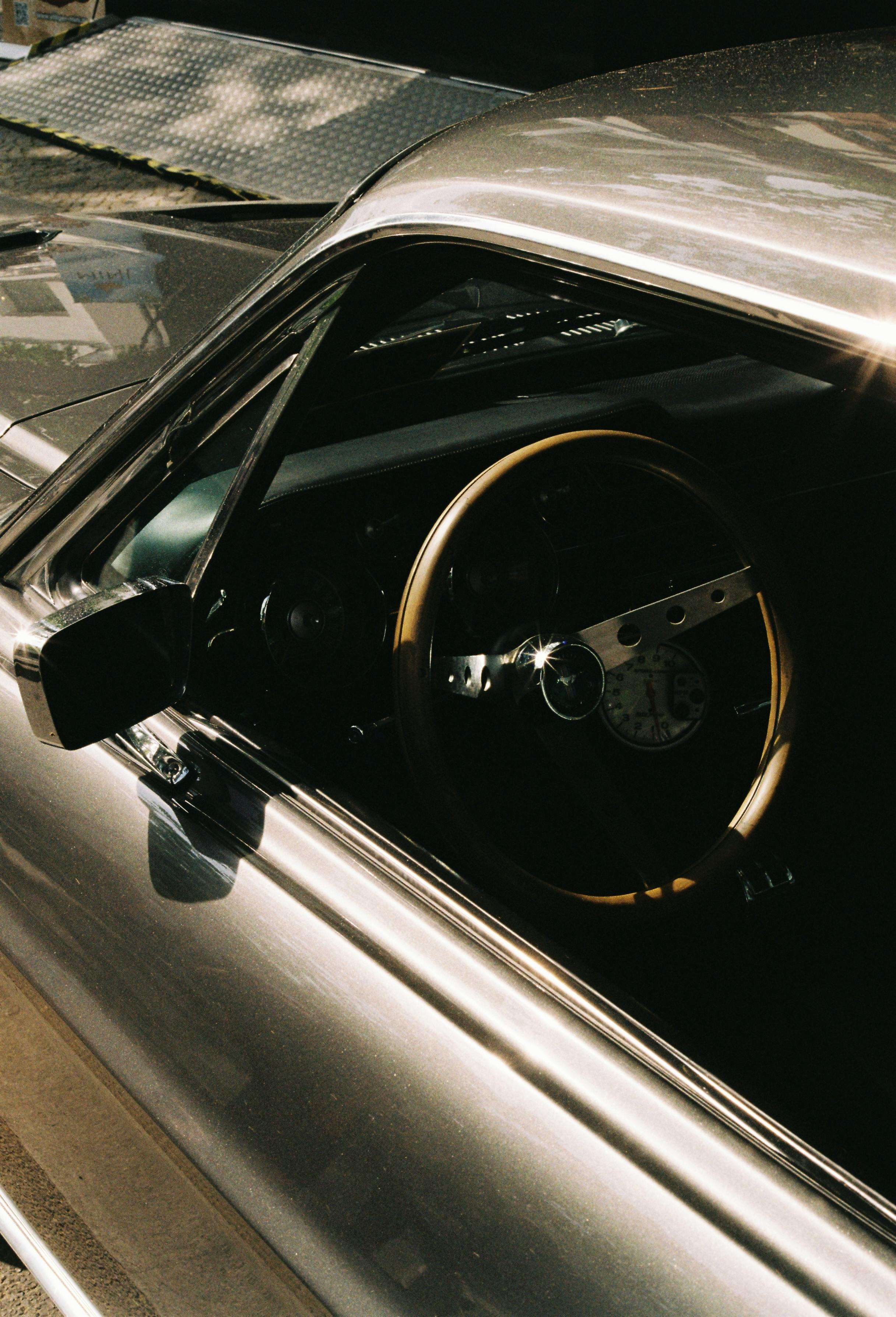 side view of silver classic retro car