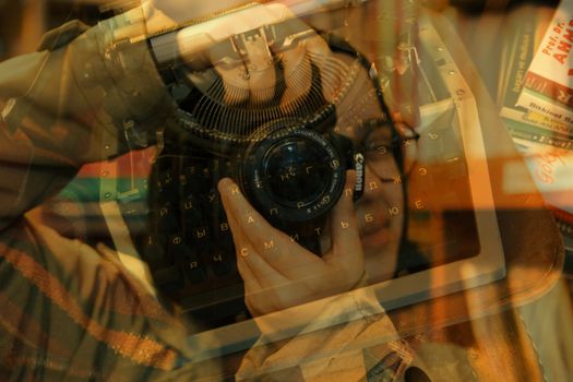 Artistic double exposure featuring a vintage typewriter and a photographer with a camera.