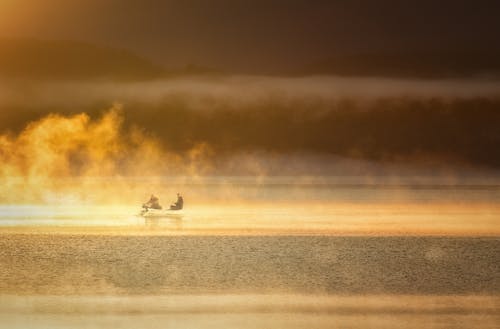 Free stock photo of fisherman, foggy lakes, foggy morning