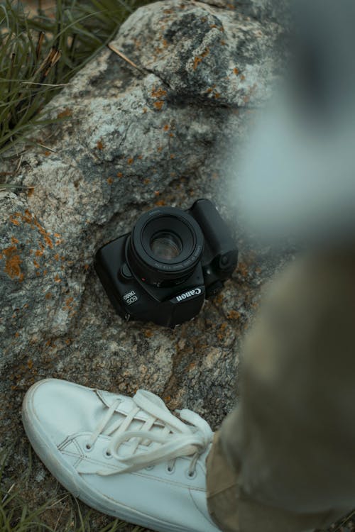 бесплатная Бесплатное стоковое фото с canon, аналоговый, белый ботинок Стоковое фото