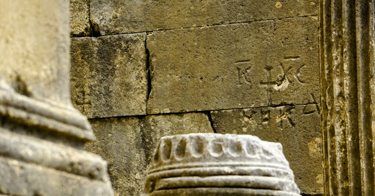 Inscription Carved on the Wall in Ancient Ruins · Free Stock Photo