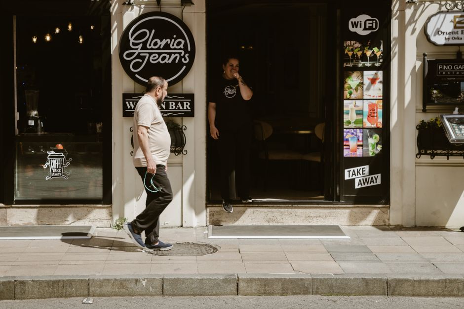 A cozy cafe in Ireland with a prominent 'Free Wi-Fi' sign