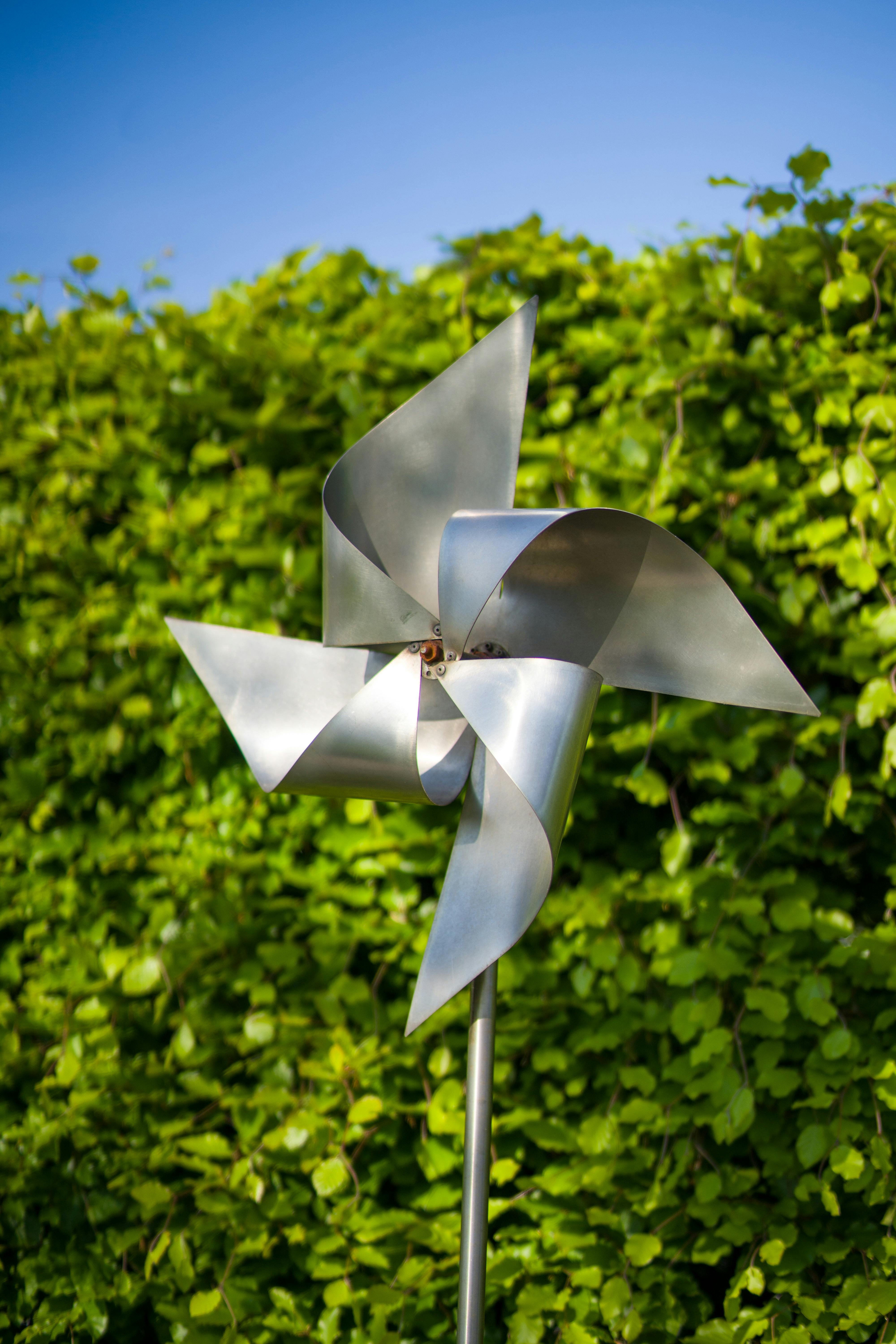 close up of a silver garden windmill