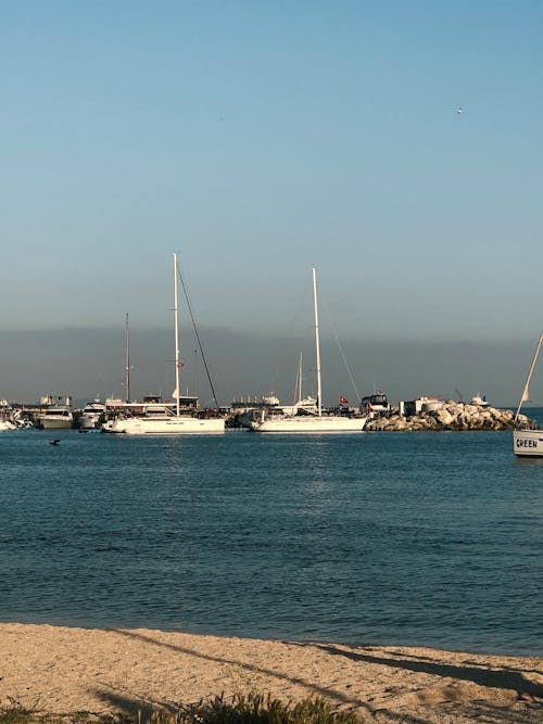 A view of boats docked at the beach