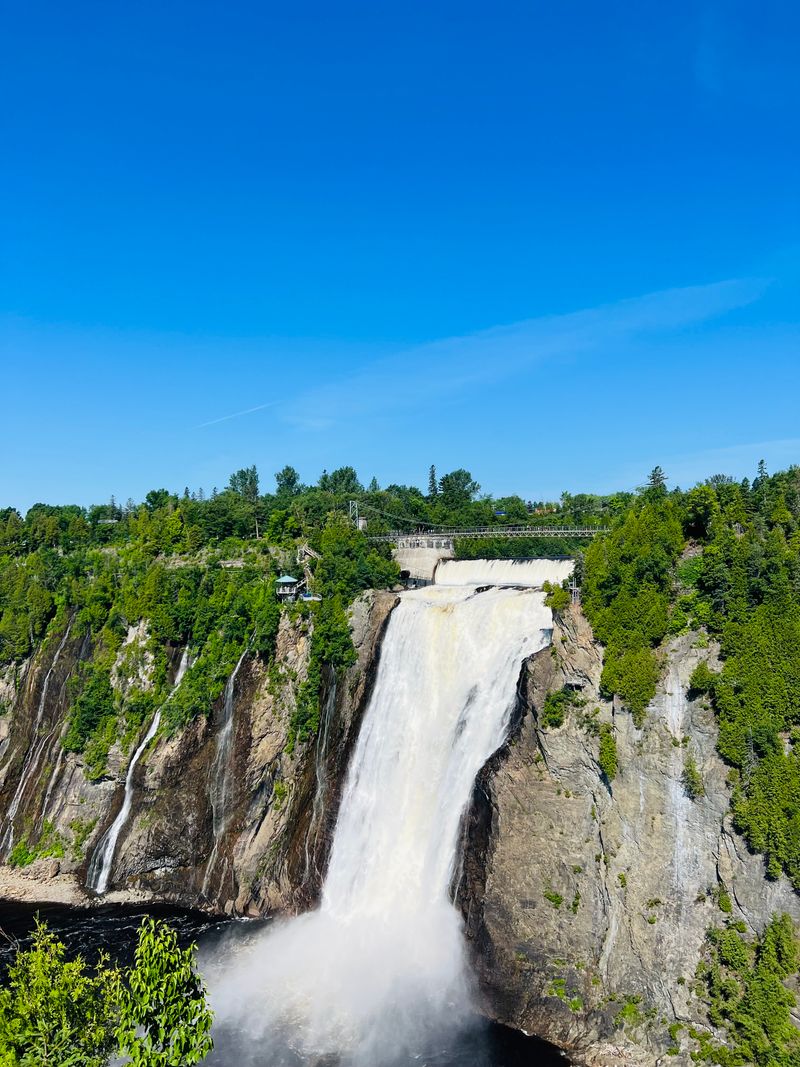 Montmorency Falls plunging into the Montmorency River in Quebec