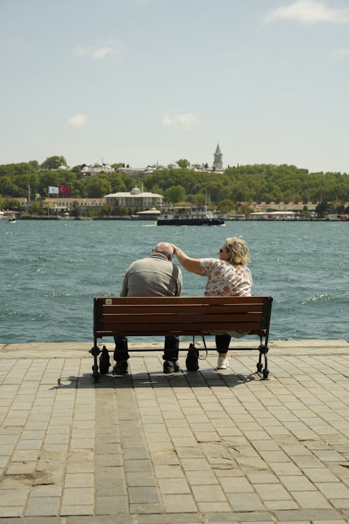 A couple sitting on a bench