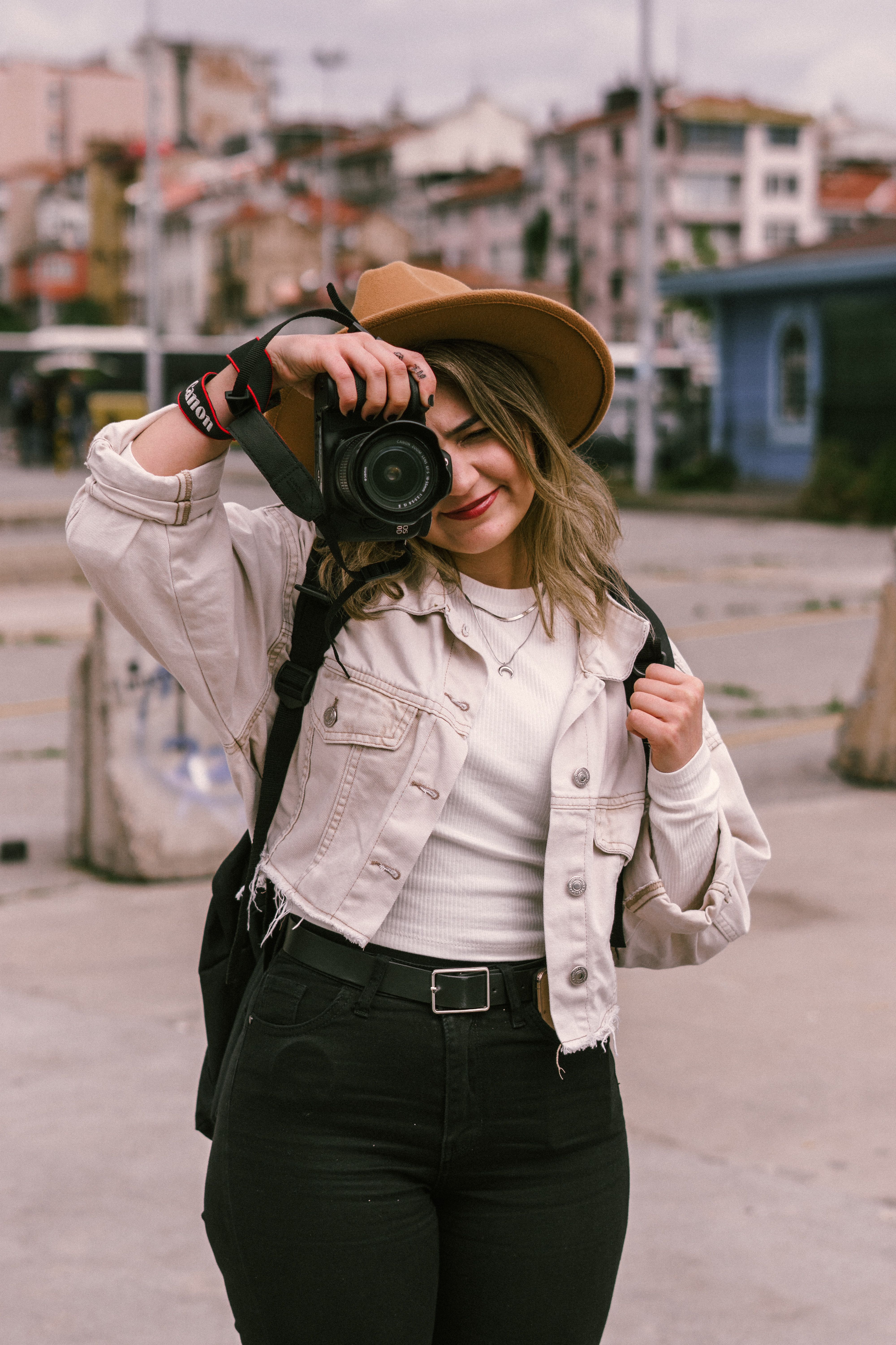 Portrait of Woman with Camera · Free Stock Photo