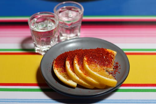 Lemon Slices with Spice and Water Glasses behind