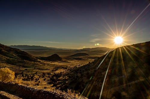 Безкоштовне стокове фото на тему «вродлива, гори, Захід сонця»