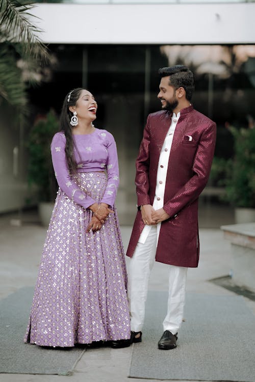 A man and woman in traditional indian attire