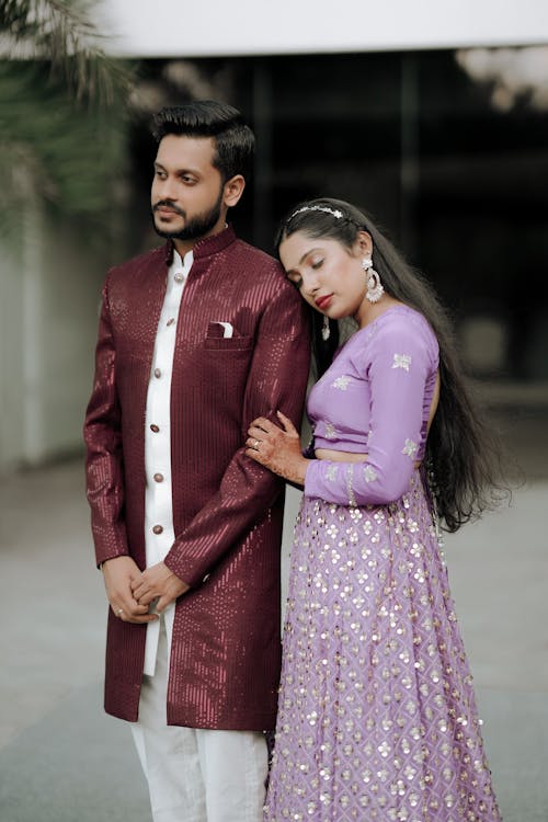 A man and woman in traditional indian attire