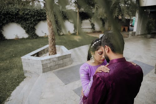 A couple embracing in the garden