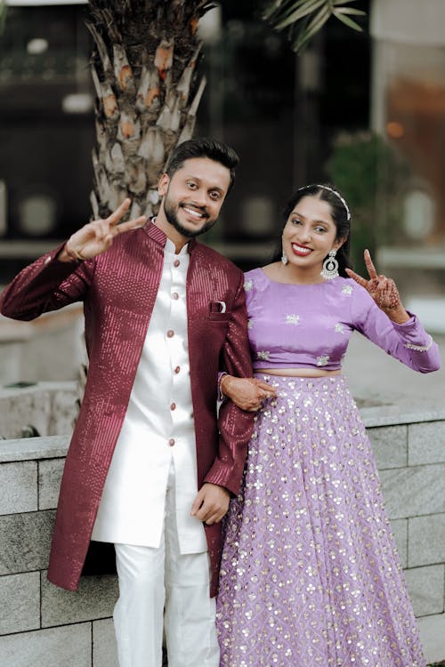 A man and woman in traditional indian attire