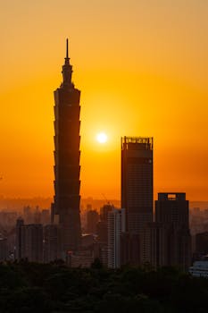 Stunning sunset over Taipei 101 and surrounding skyline in Taipei, Taiwan.