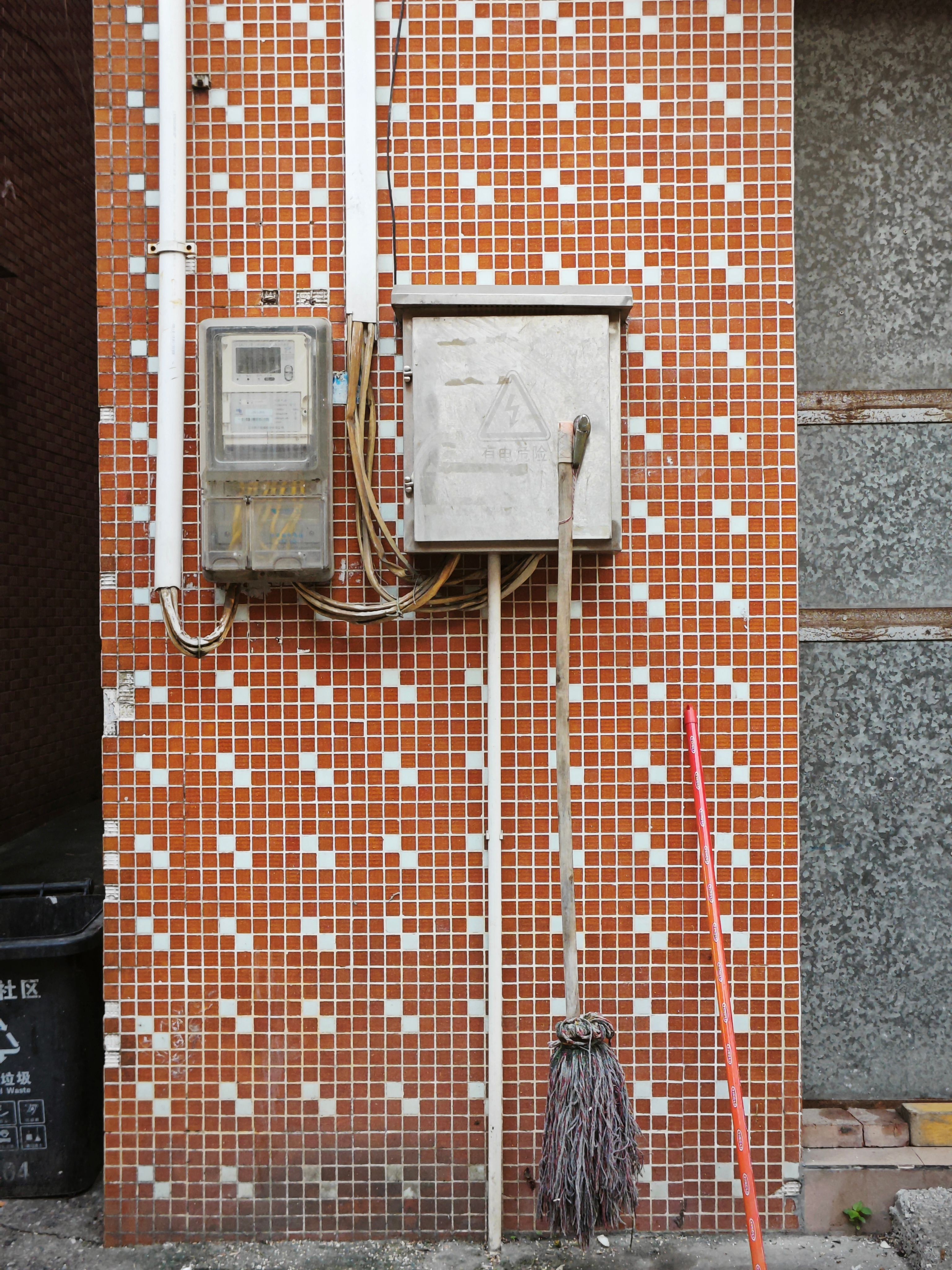Electricity Meter and Electrical Box on the Mosaic-Tiled Facade · Free ...