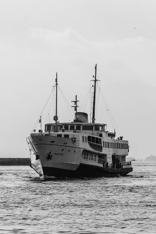 Free A black and white photo of a ferry boat Stock Photo