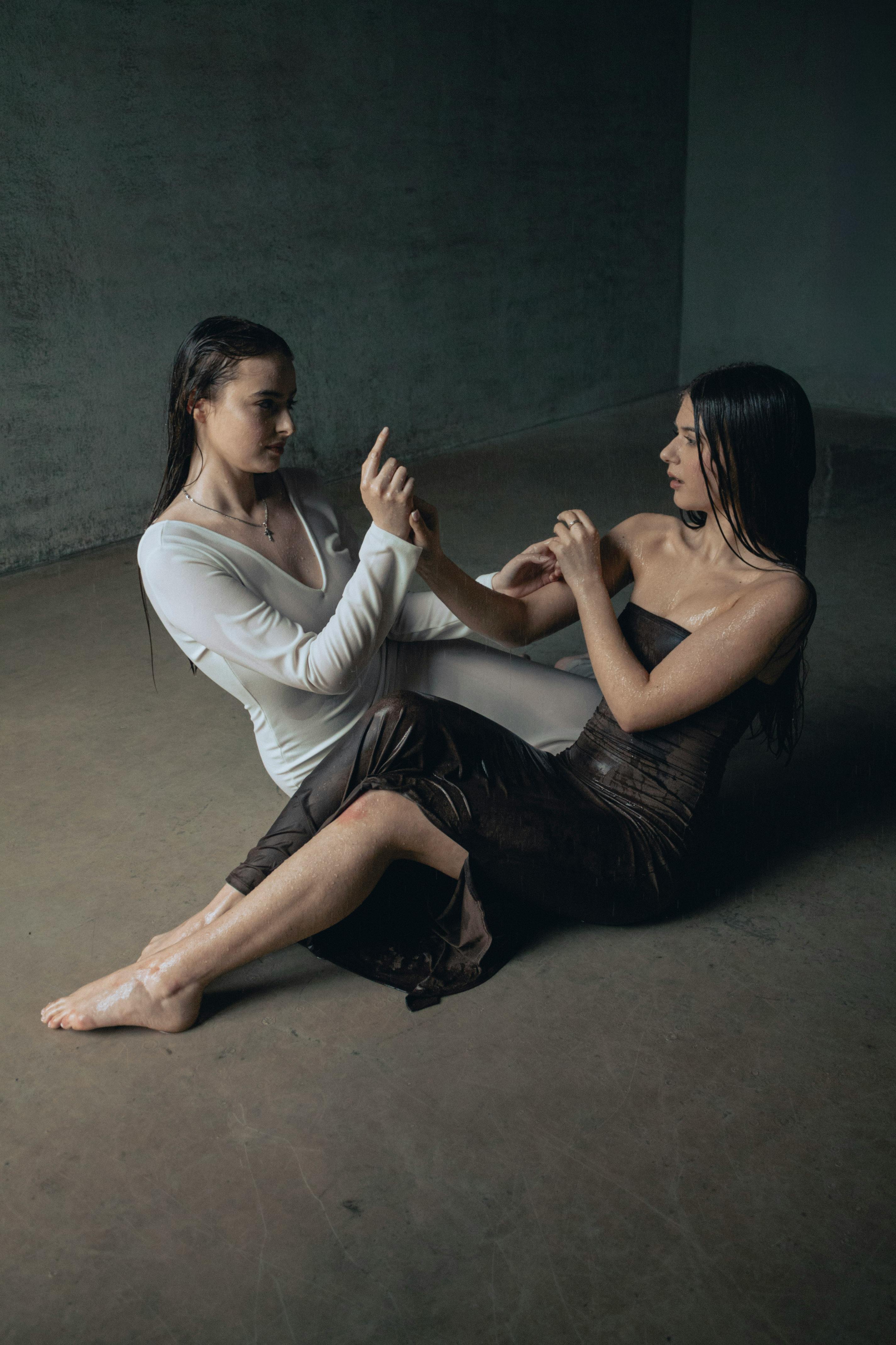 Two Women in Wet Clothes · Free Stock Photo