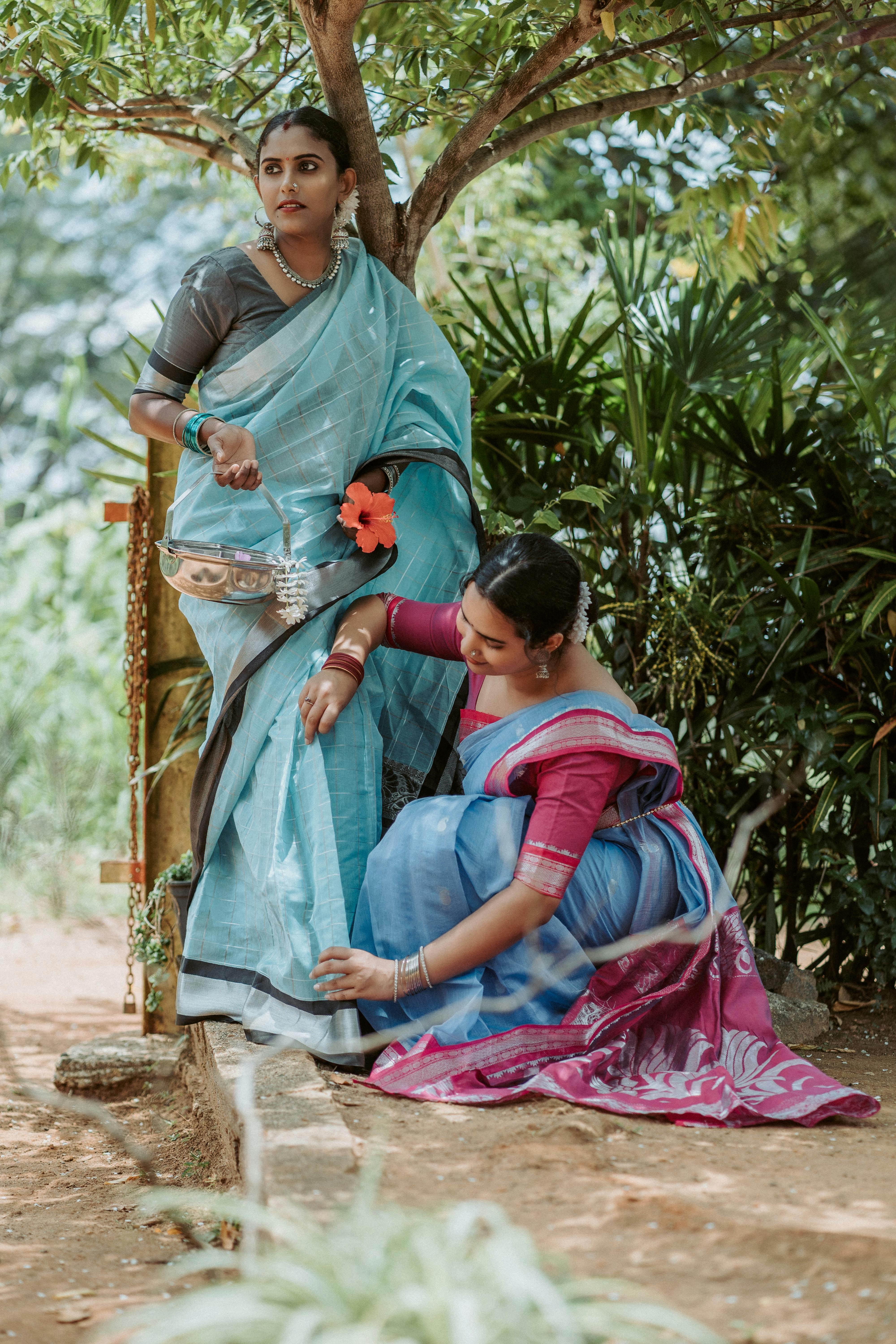 women in traditional dresses