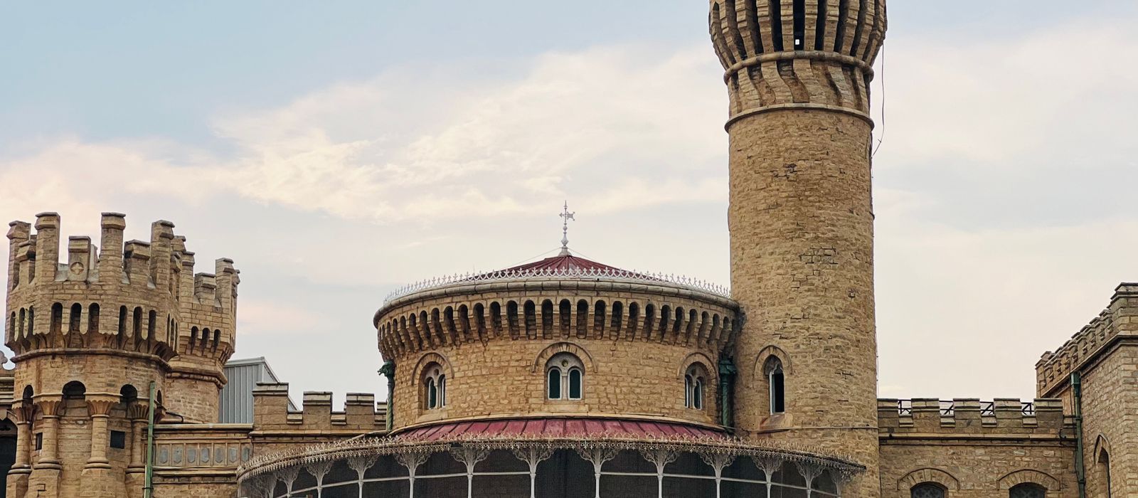 Front view of Bangalore Palace with its stone architecture and historic towers in Bengaluru, India.