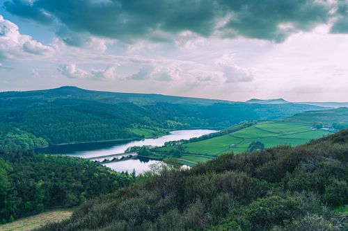 Free Aerial view of the picturesque Ladybower Reservoir and surrounding landscape in England. Stock Photo