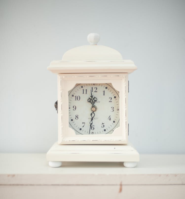 White Table Clock Displaying 12:30