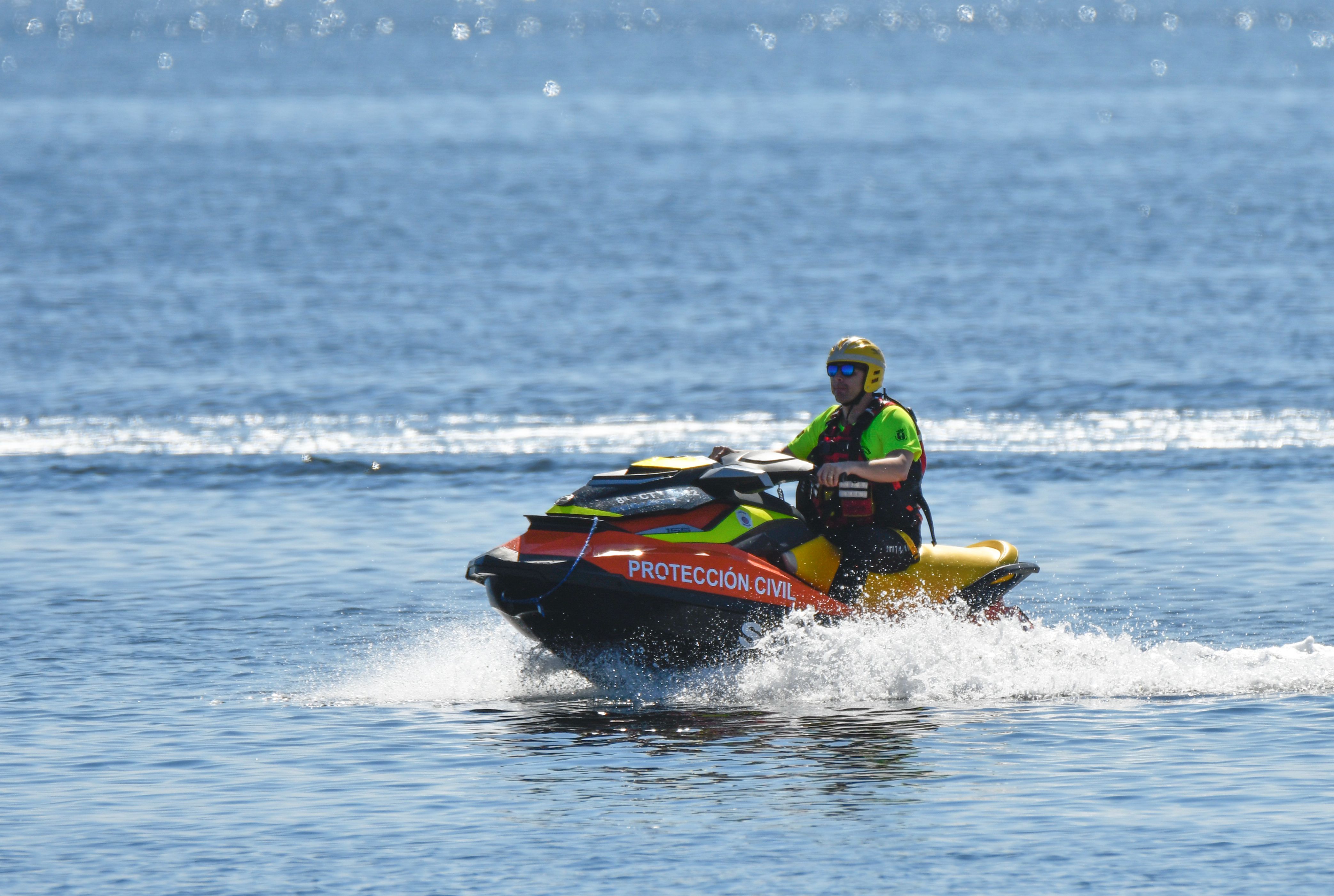 Civil Protection officer riding a jet ski on the sea near San Javier, Spain.
