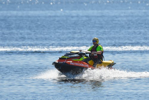 A man riding a jet ski in the water