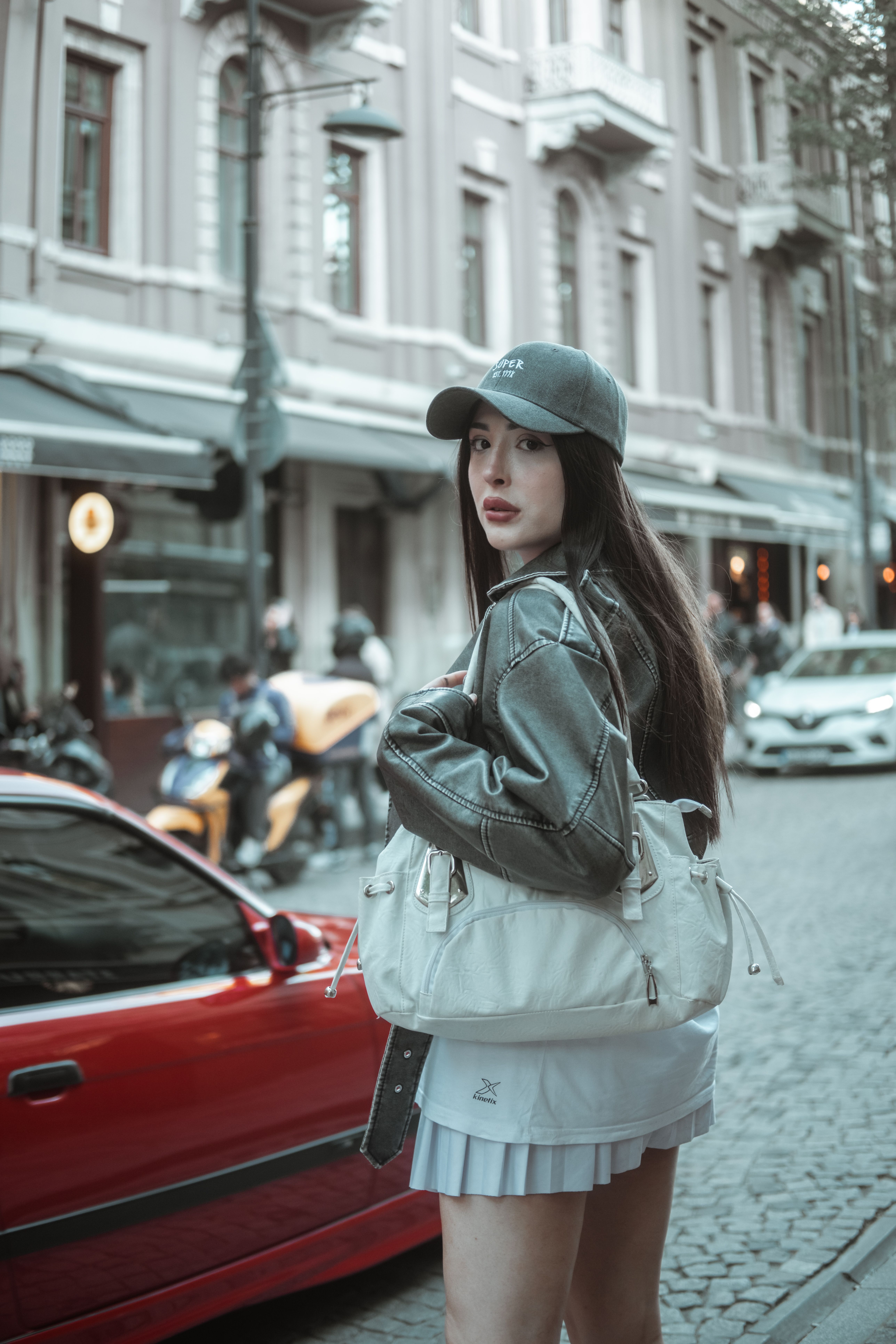 Standing Woman in Black Leather Jacket · Free Stock Photo