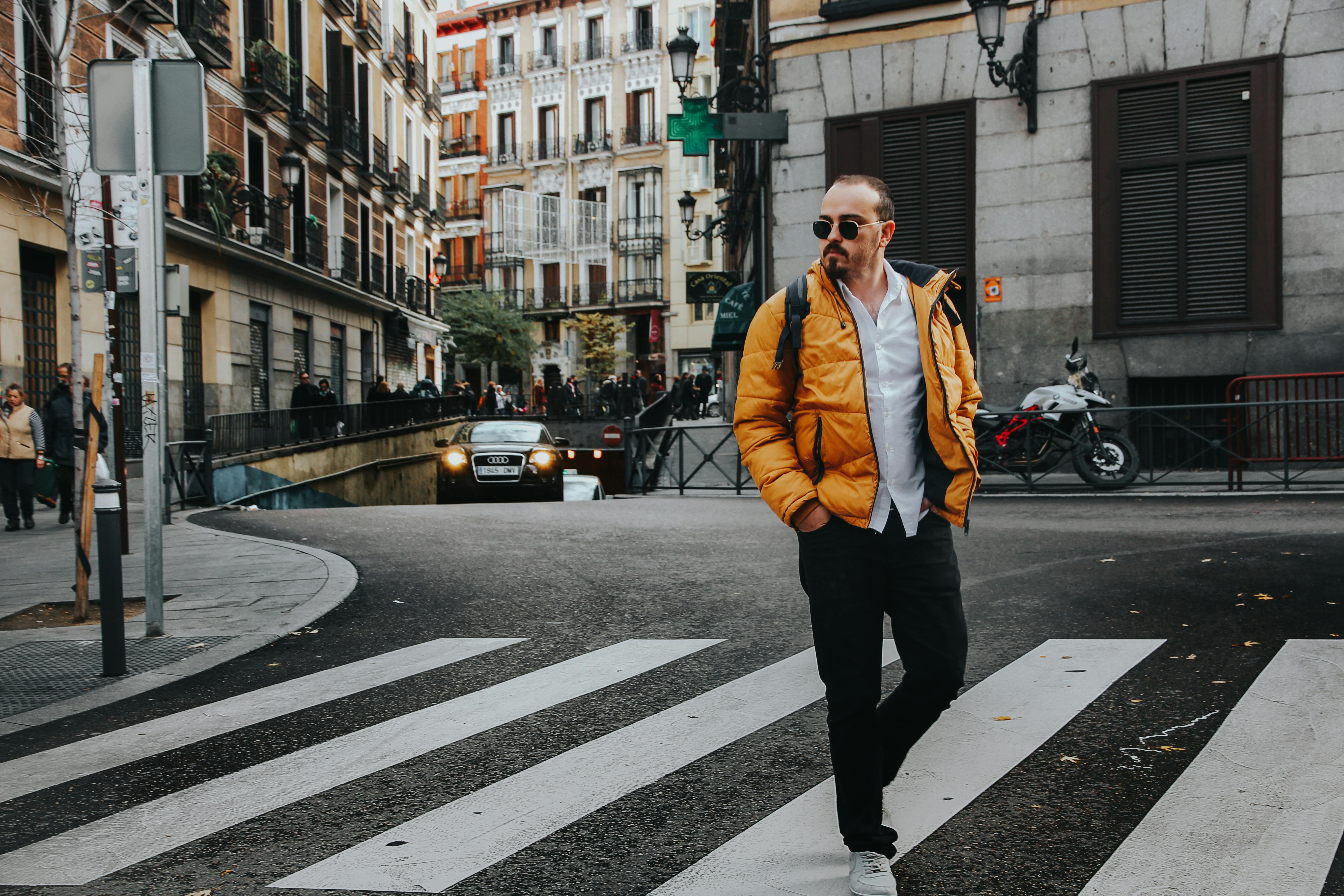 Photo of Man Walking on Pedestrian Crossing \u00b7 Free Stock Photo