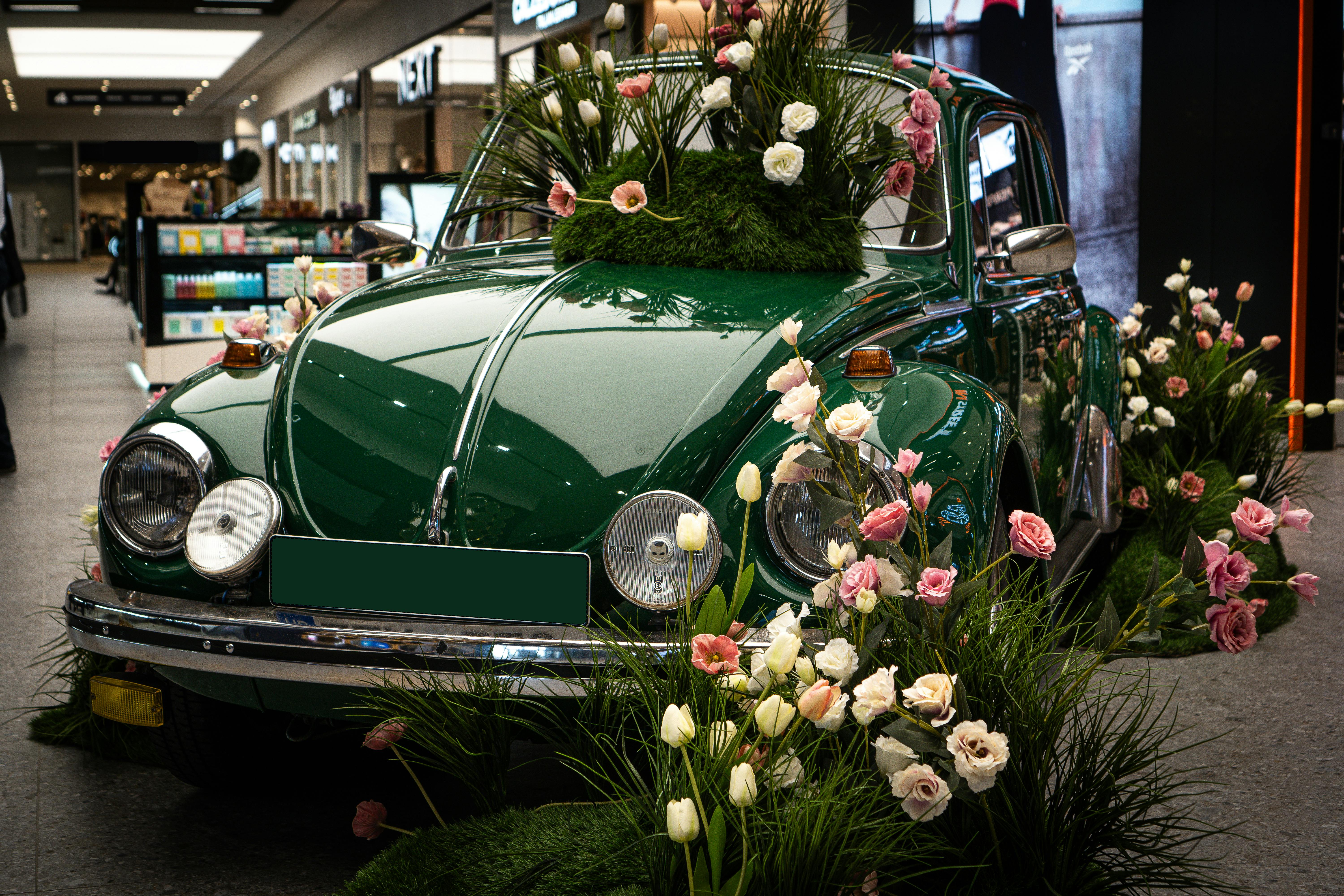 Designer creating a custom display stand for mall activation