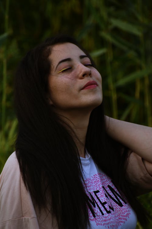 Free Photo of Woman Closing Her Eyes Stock Photo