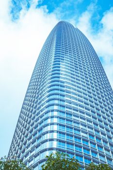 A striking upward view of the iconic Salesforce Tower against a clear blue sky in San Francisco.