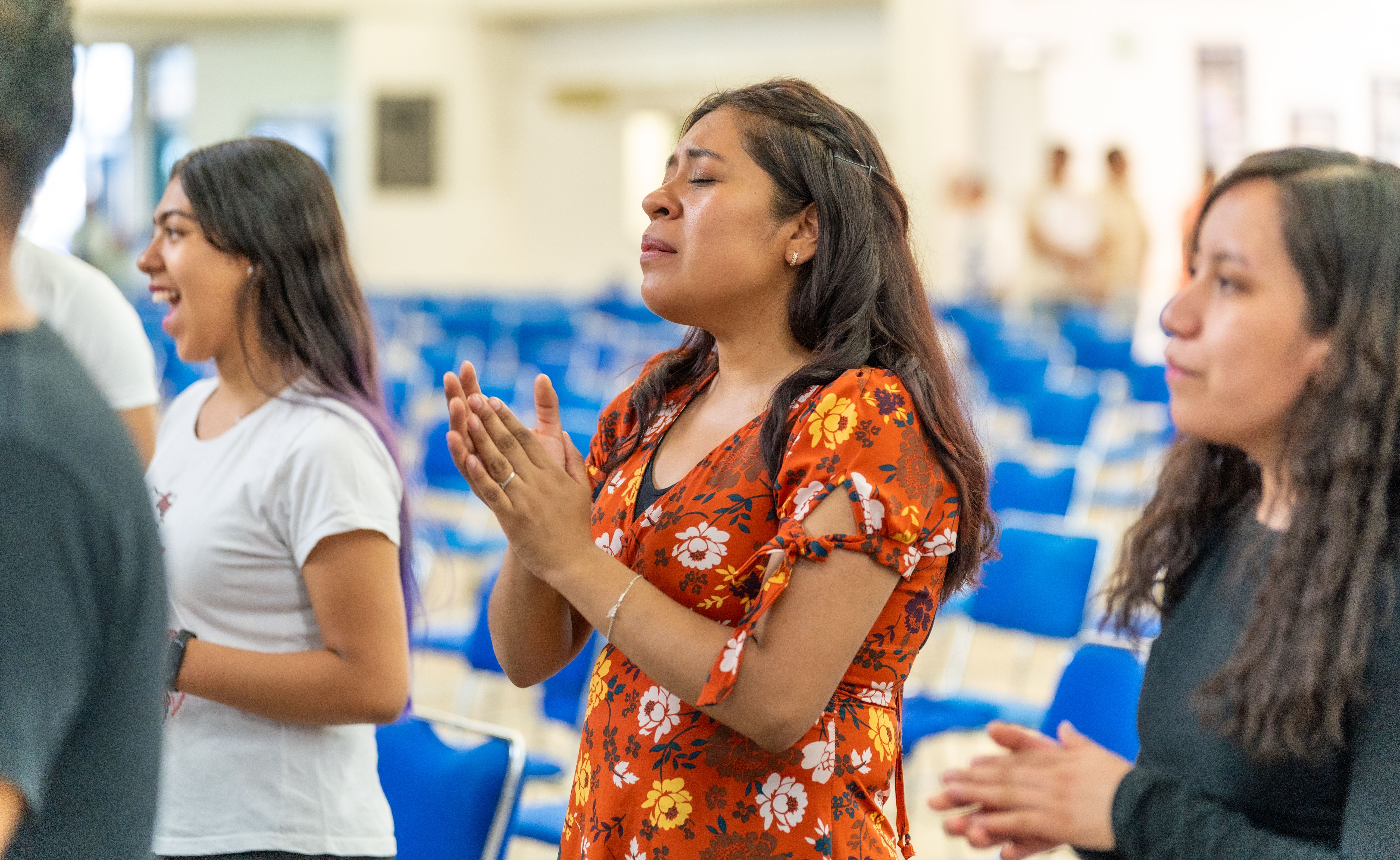 Brunette Woman in Sundress Praying · Free Stock Photo