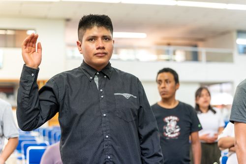 Free People engaged in a spiritual ceremony indoors in Ciudad de México, focusing on faith and unity. Stock Photo