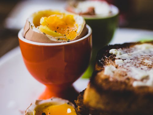 Free Egg on a Ceramic Cup Stock Photo