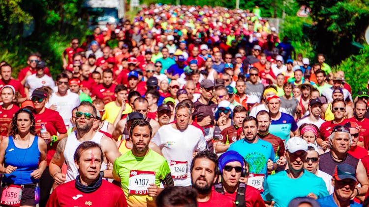 Crowd Of Male And Female Runners